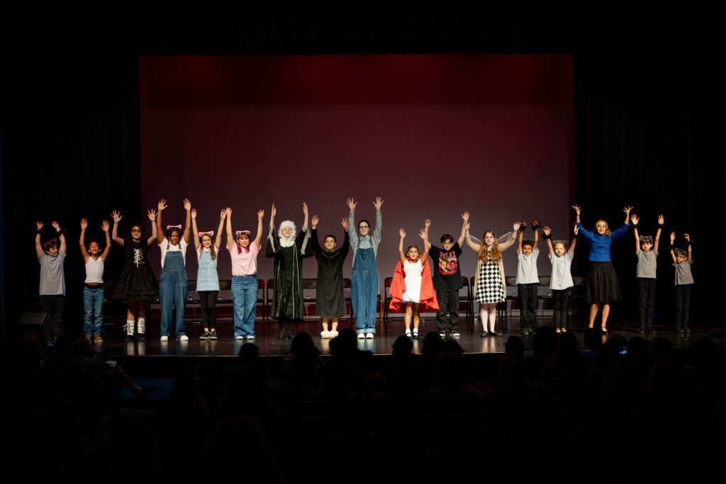 Cast of The Big Bad Musical strikes final pose during Big Bad Prologue performance.
